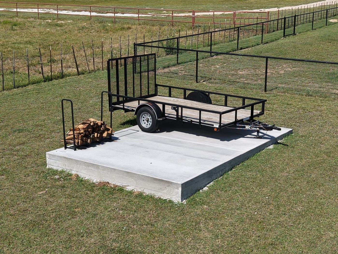Thick concrete equipment pad in a pasture